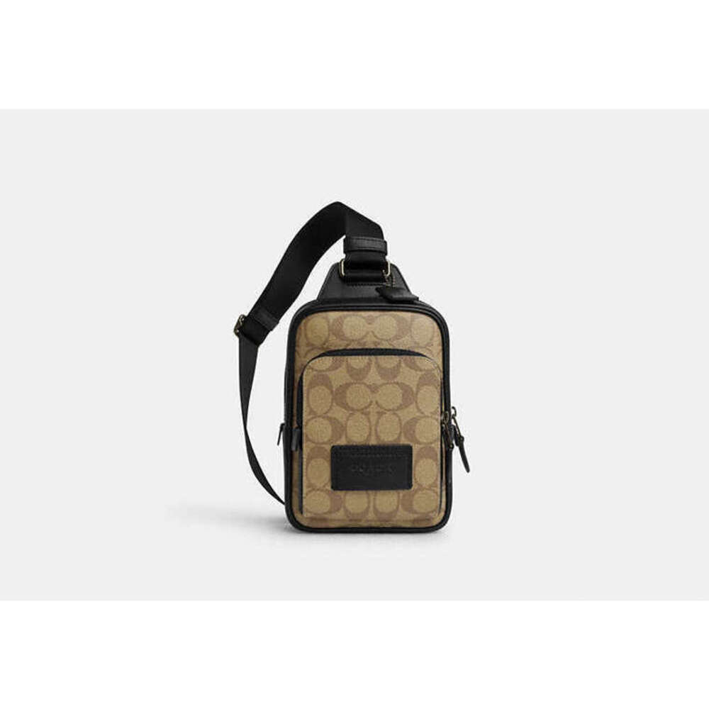 Coach unisex Track Pack 14 In Signature Canvas like brand new